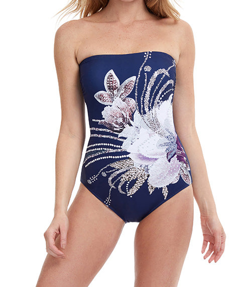 DOLCE VITA COLLECTION: ESSENTIALS BY GOTTEX  Bandeau One Piece with Soft Cups   A Glamorous Panel Print Of A Big Side Flower With Bead Photoprint Motif On A Navy Background To Give A Glitzy Feminine Look.  Fabric Content: 70% Polyamide 30% Spandex Knitted Made in Morocco   Product#: 23DV-070
