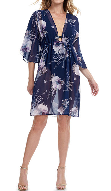 DOLCE VITA COLLECTION: ESSENTIALS BY GOTTEX   Deep V Neck Dress  A Glamorous Panel Print Of A Big Flower With Bead Photoprint Motif On A Navy Background To Give A Glitzy Feminine Look.   Fabric Content: 70% Polyamide 30% Spandex Knitted Made in Morocco   Product#: 23DV-611